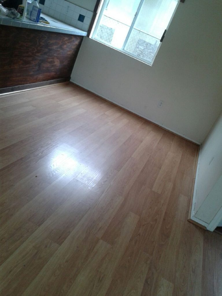 remove graffiti from wooden floor