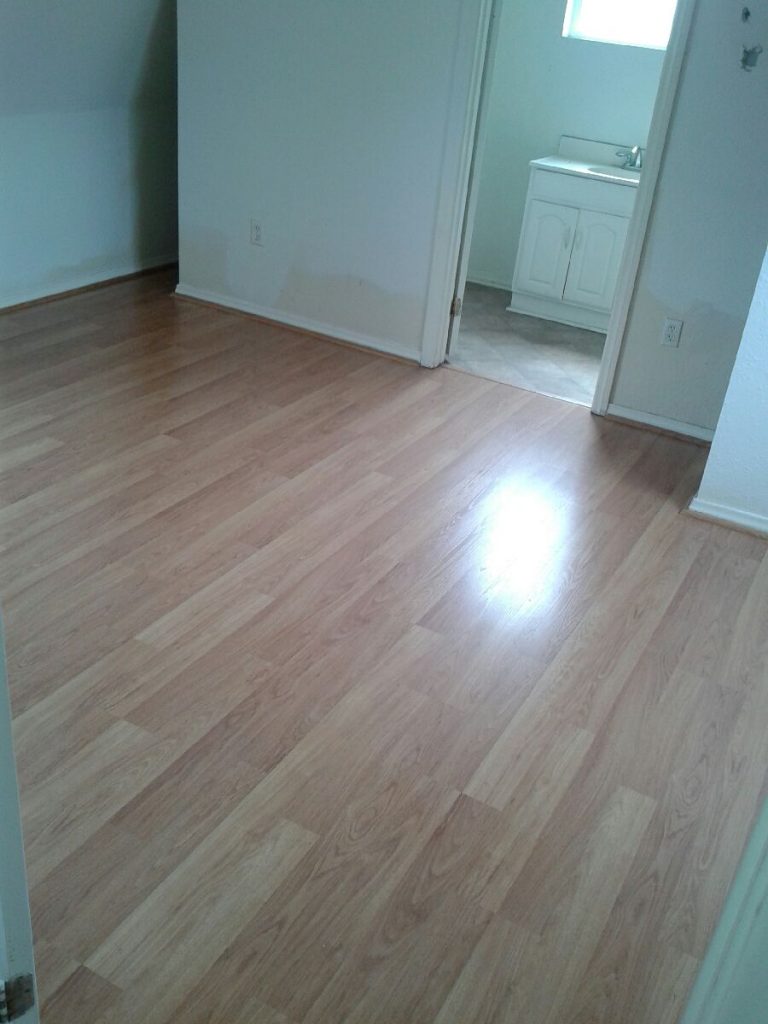 remove graffiti from wooden floor