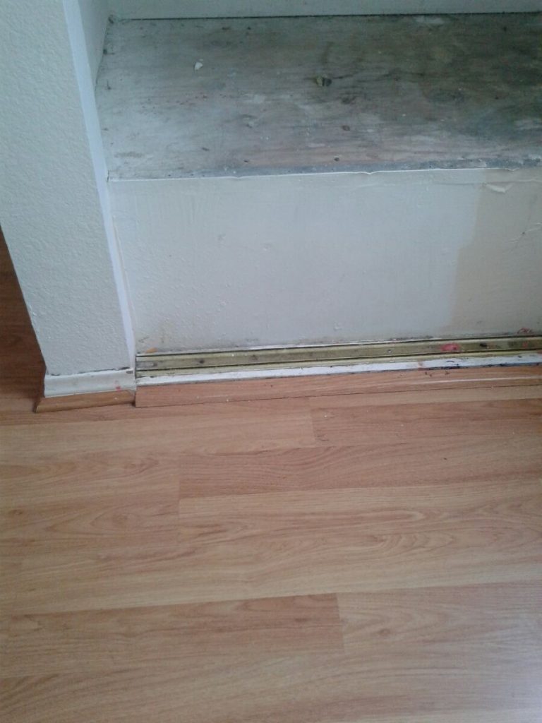 remove graffiti from wooden floor