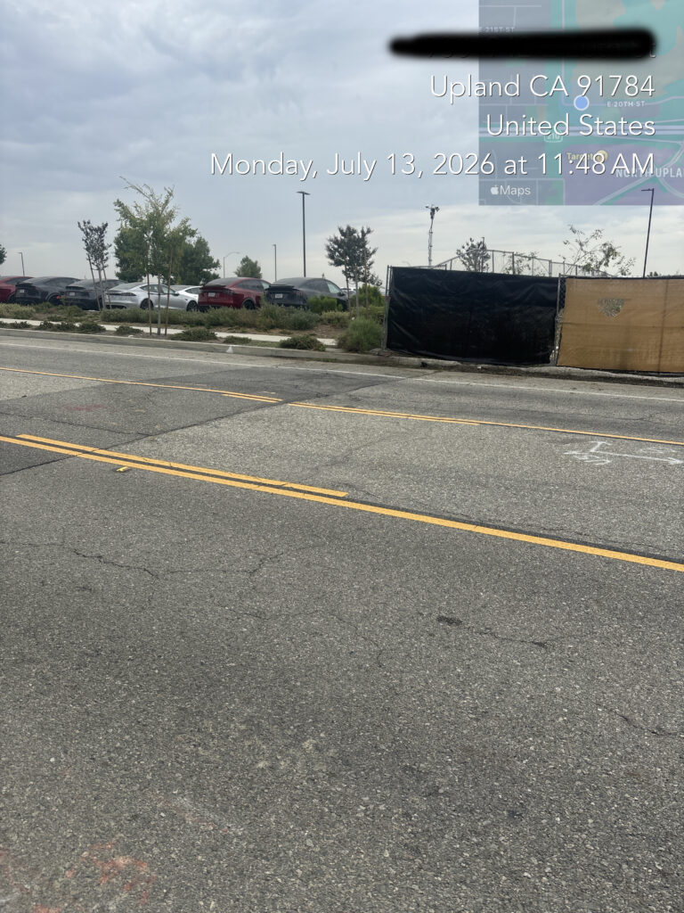 Completed parkway cleanup and repaired perimeter screening at a commercial property.